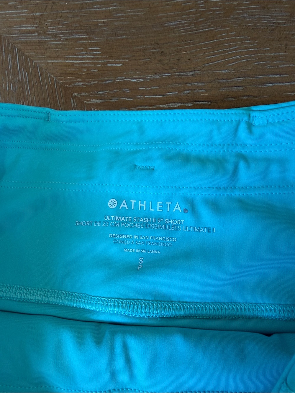 Athleta Bright Turquoise Mid-Rise Bike Shorts - Picture 4 of 8
